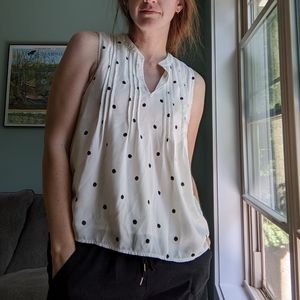 White polka dot sleeveless blouse